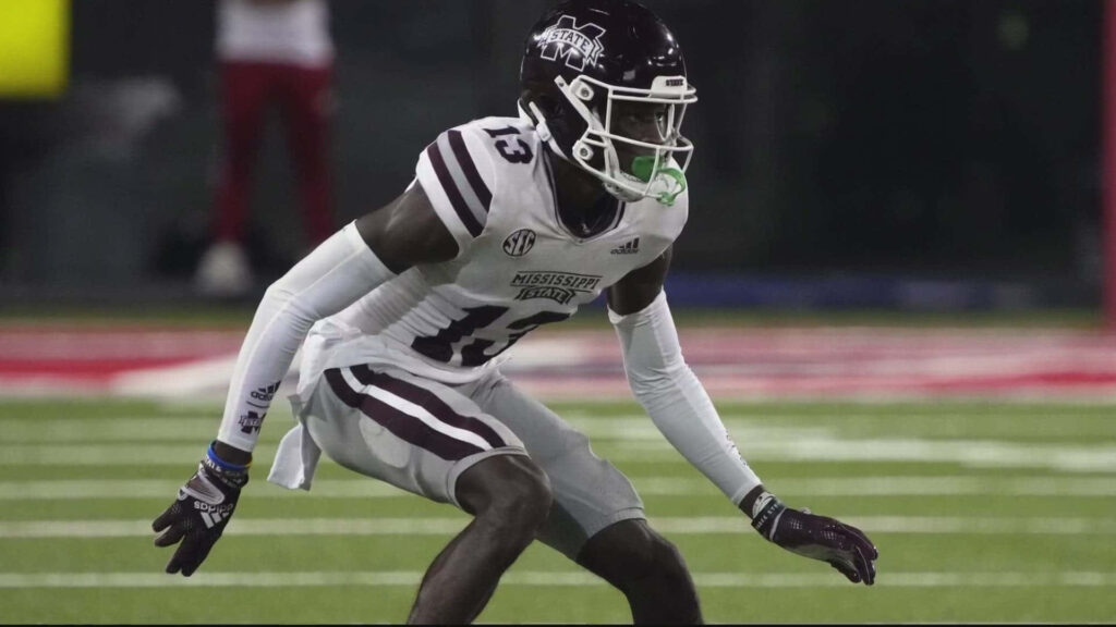 Emmanuel Forbes Jr Mississippi State Football defensive stance intense night game action wallpaper