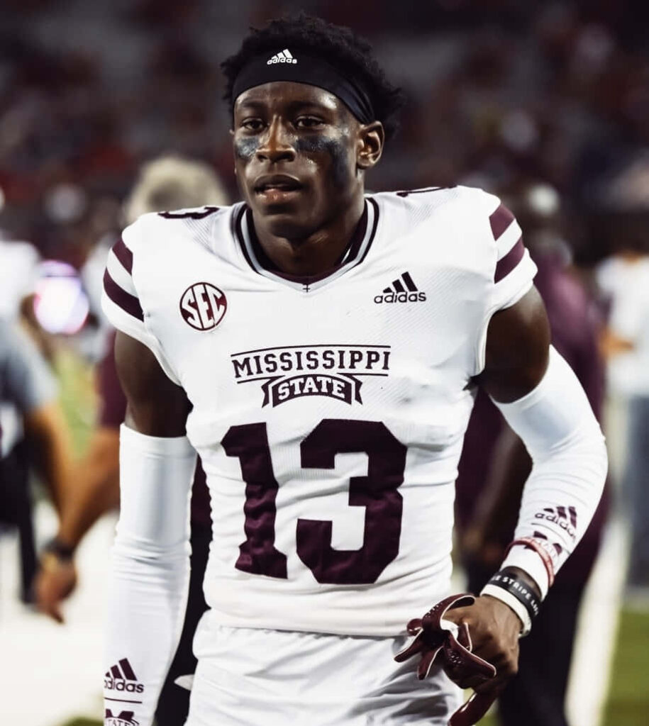Emmanuel Forbes Jr Mississippi State football player number 13 in maroon white jersey on field Wallpaper