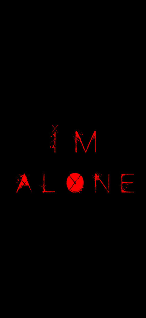 Emo wallpaper with distressed red I AM ALONE text on black background capturing isolation mood