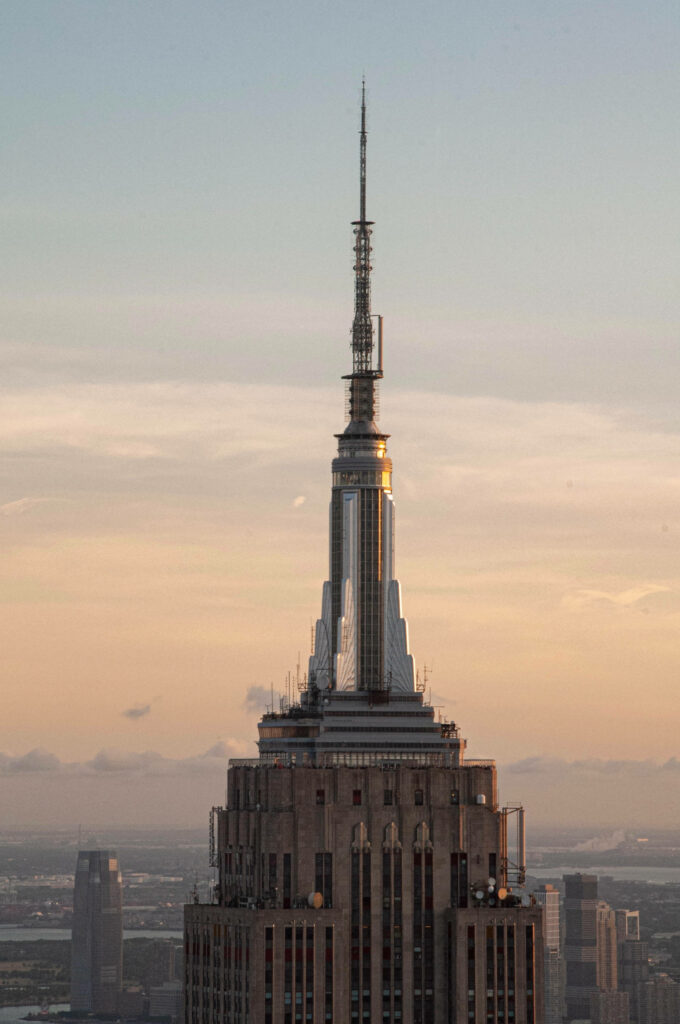 Sky-High Majesty: Capturing the Empire State Building's Iconic Spire for Your iPhone Wallpaper