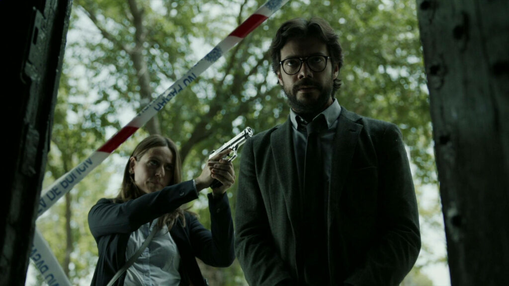 The Relentless Pursuit: A Strong-Willed Heroine Challenges Professor Amidst Urban Decay Wallpaper