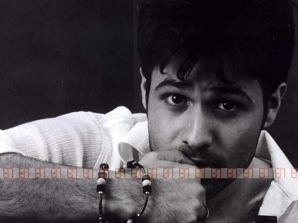 Black and white close-up portrait of Emraan Hashmi with expressive eyes and dramatic contrast Wallpaper