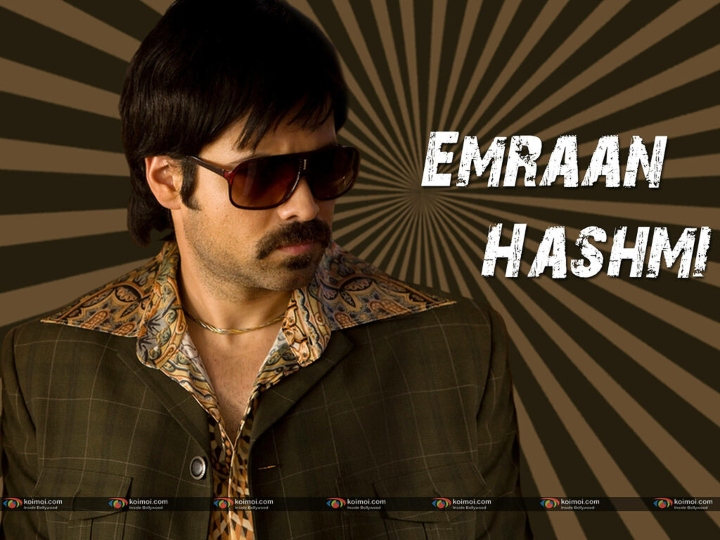 Emraan Hashmi in retro patterned shirt and checked blazer against bold vintage radial background Wallpaper