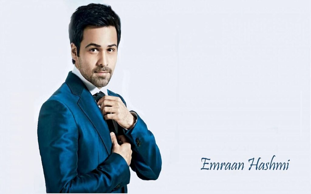 Emraan Hashmi in sharp blue suit posing confidently on white background stylish wallpaper