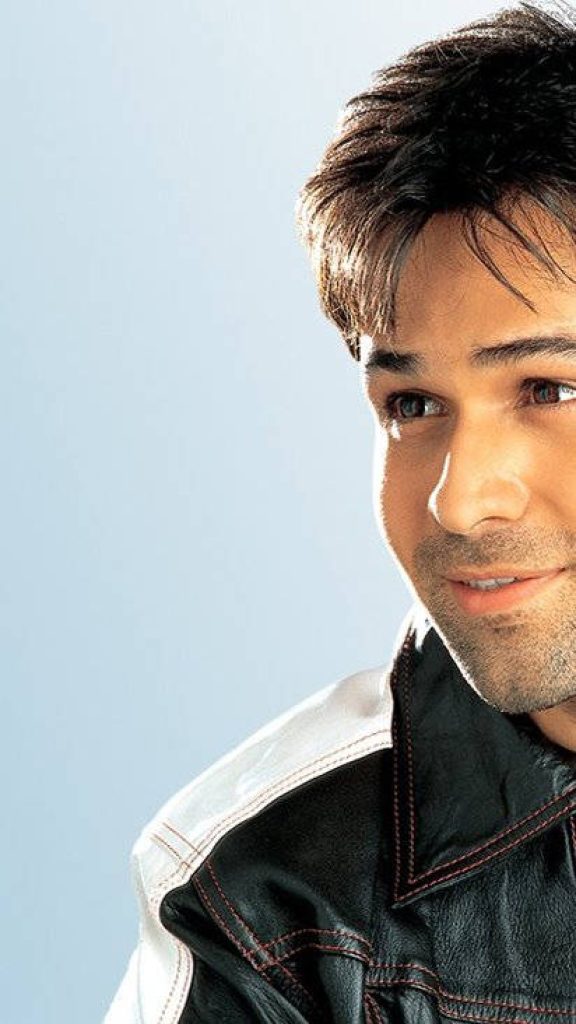 Emraan Hashmi stylish portrait in black white leather jacket on blue background mobile wallpaper