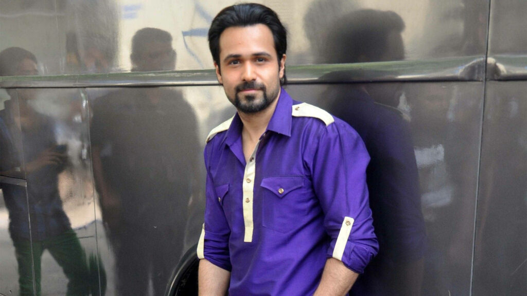 Emraan Hashmi in purple jacket against metallic background stylish modern wallpaper image