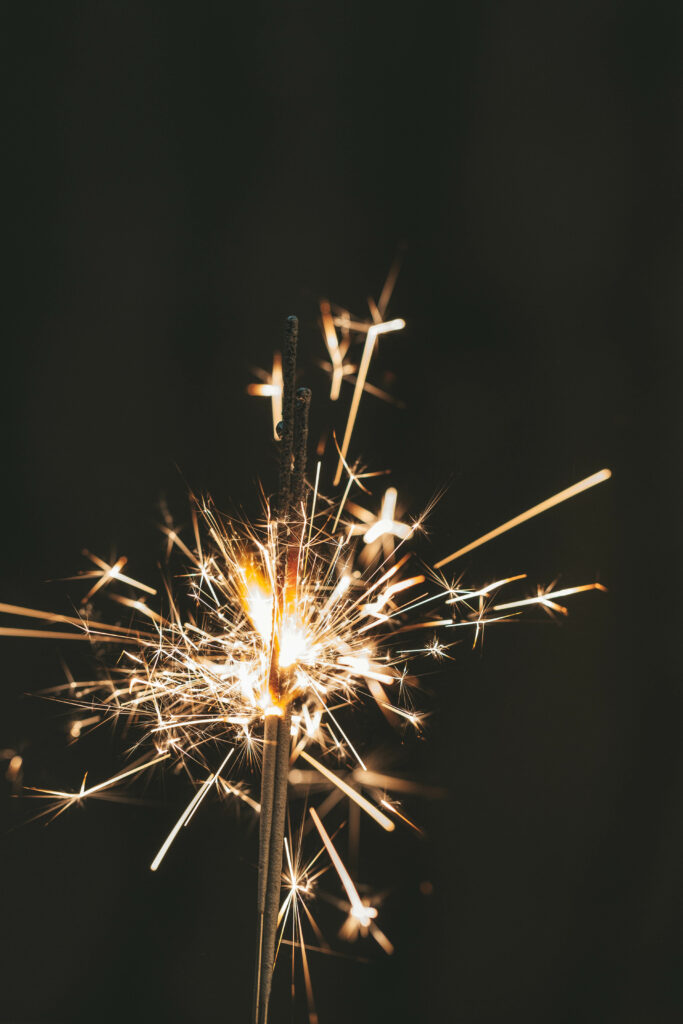 Festive Sparkler Glow Wallpaper – Vibrant 3840x5760 Background