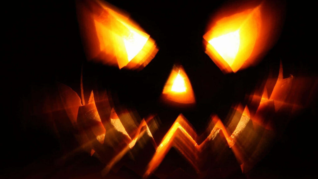 Pumpkin's Bewitching Home: A Mesmerizing Halloween Night in an Enchanted Grove Wallpaper