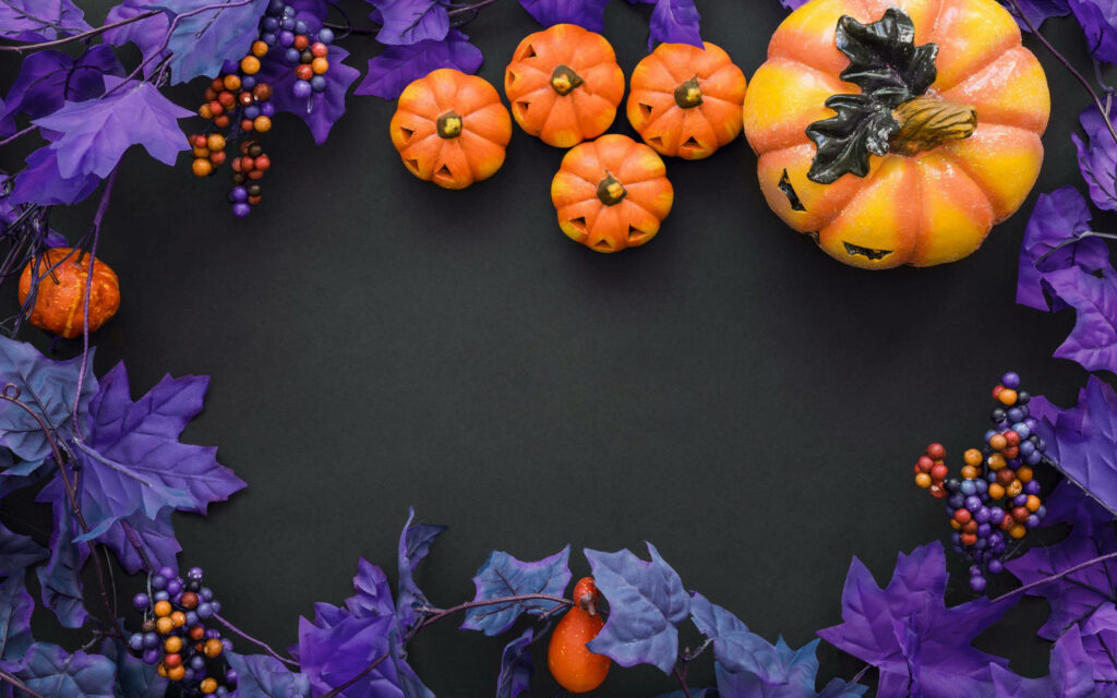Purple Autumn Delight: Whimsical Halloween Vibes with Carved Pumpkins on a Sleek Black Canvas Wallpaper