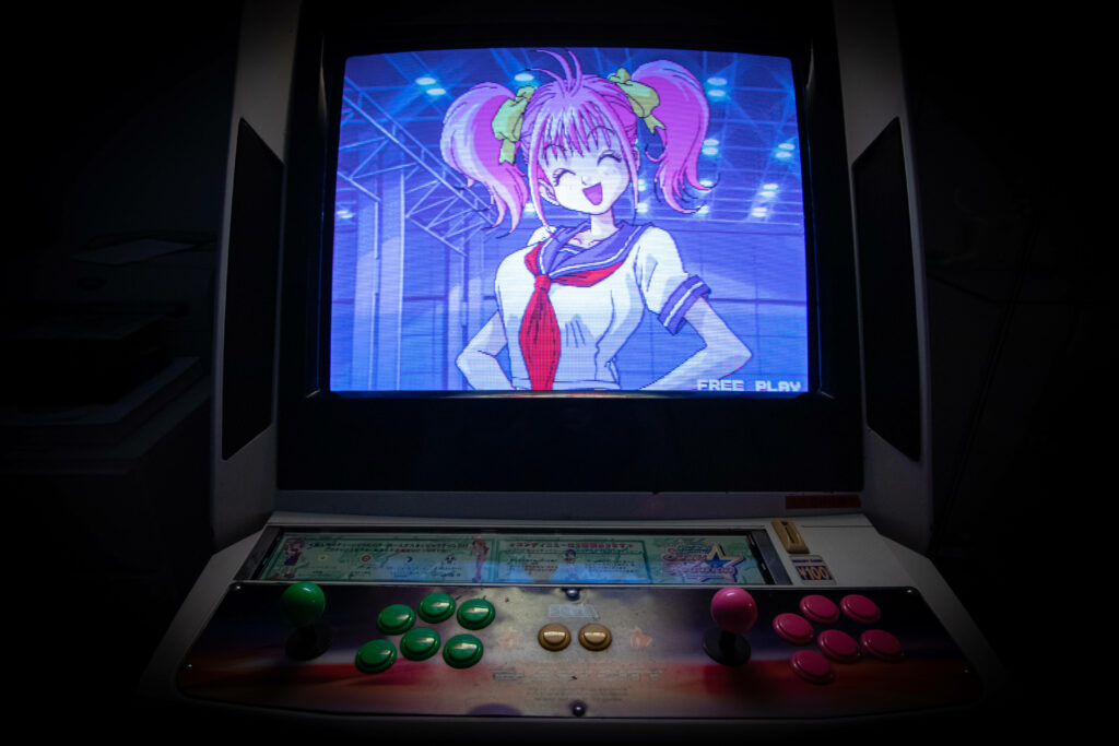 Vibrant Anime Character Wallpaper on Retro Arcade Screen Background