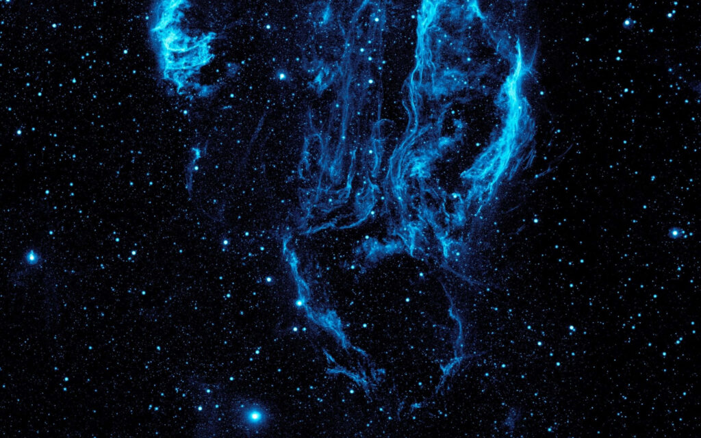 Stunning blue cosmic nebula wallpaper in a starry deep space background.