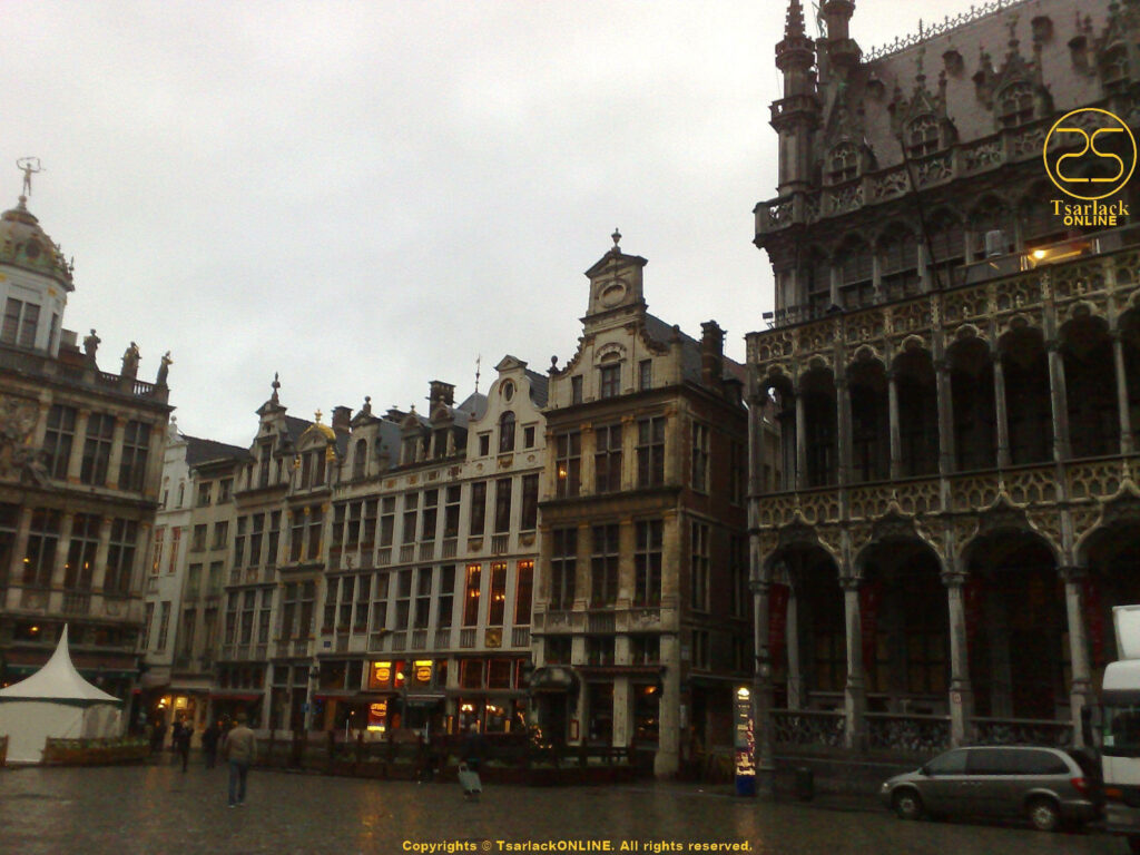 Enchanting Brussels Cityscape Wallpaper: Rainy Sky & Historic Charm