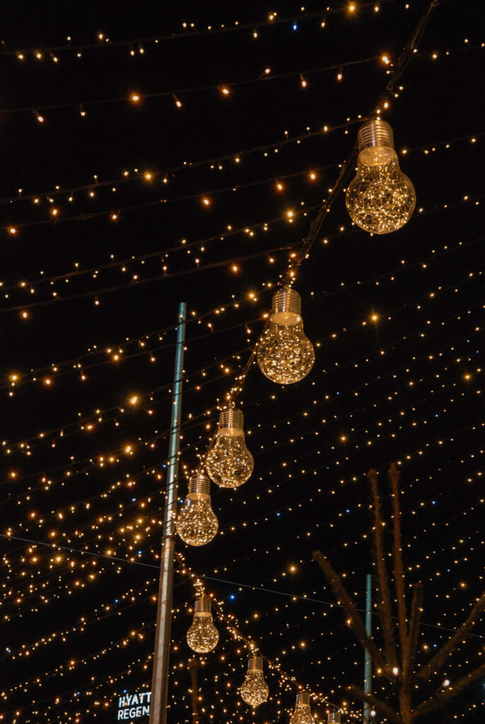 Enchanting Christmas Lights Wallpaper: Festive Dark Sky Background