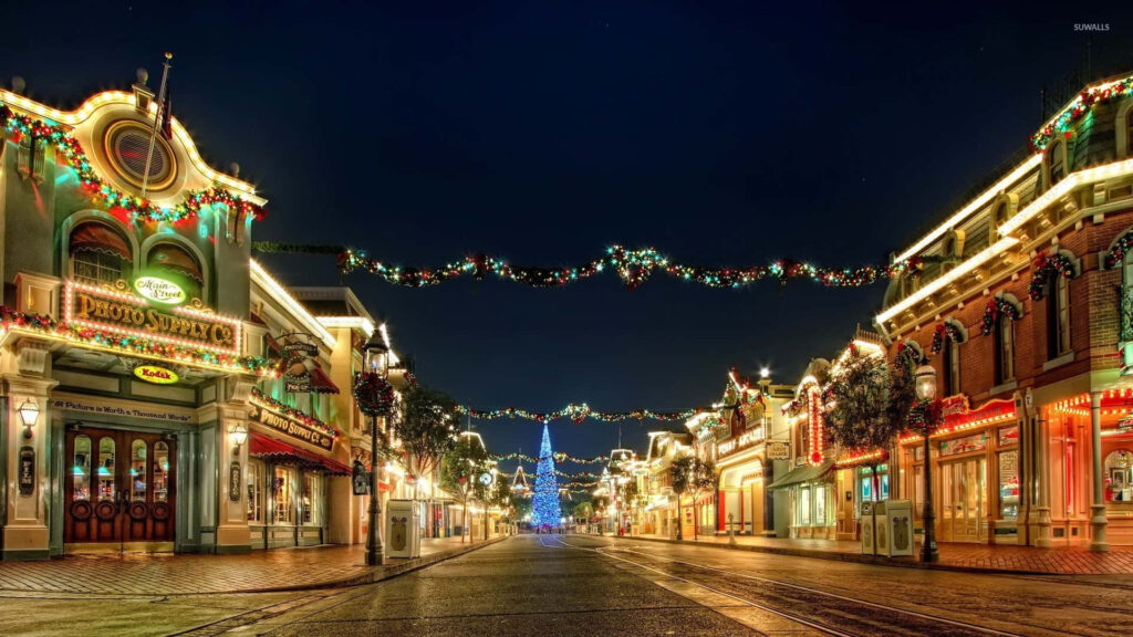 Enchanting Christmas Village Wallpaper: Festive Main Street Glow