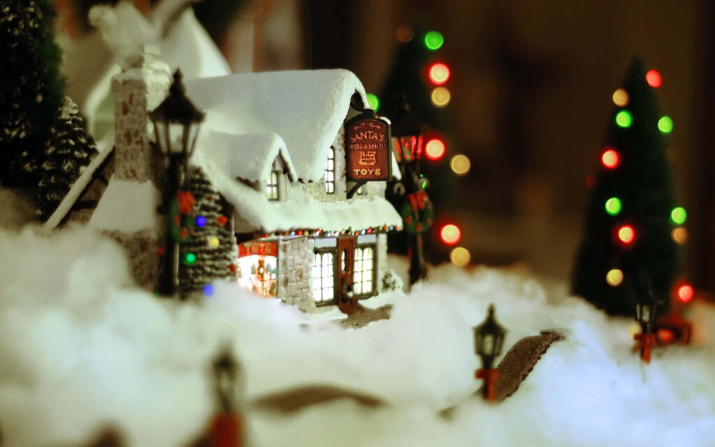 Enchanting Snow-Covered Village Christmas Wallpaper Background