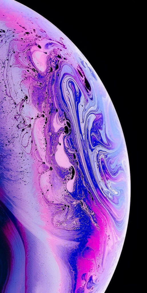 Enchanting Pink and Purple Abstract Pattern Adorning iOS 16 Wallpaper: A Whimsical Cybernetic Depiction of Planet
