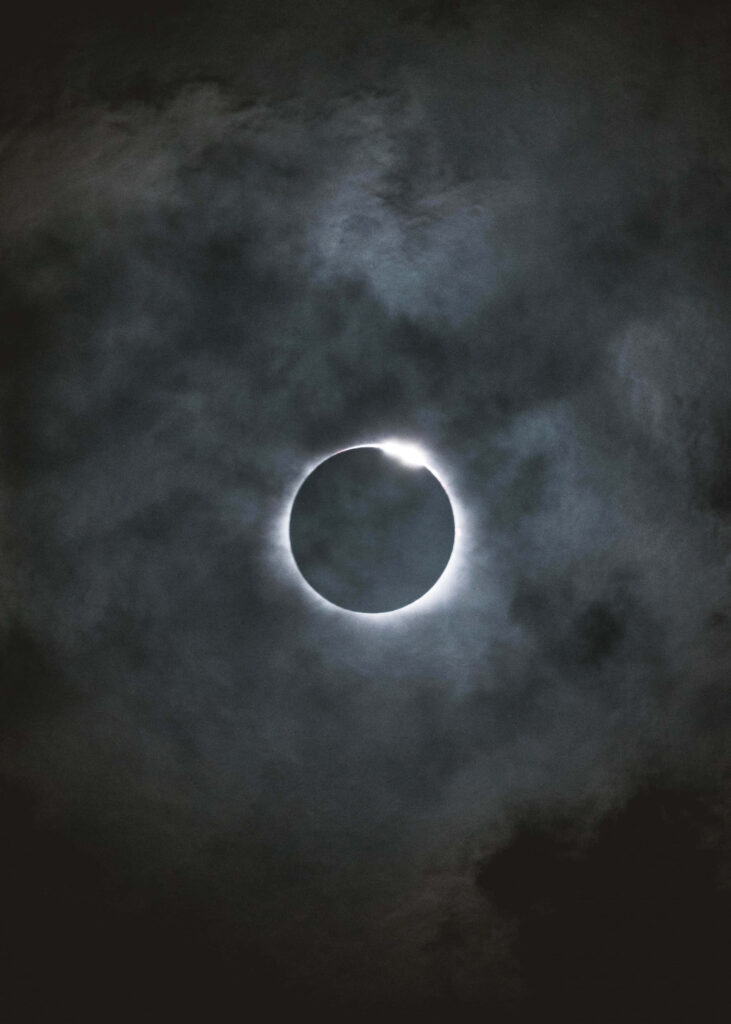 Enchanting Dark Moon Wallpaper: Atmospheric Cloudy Background