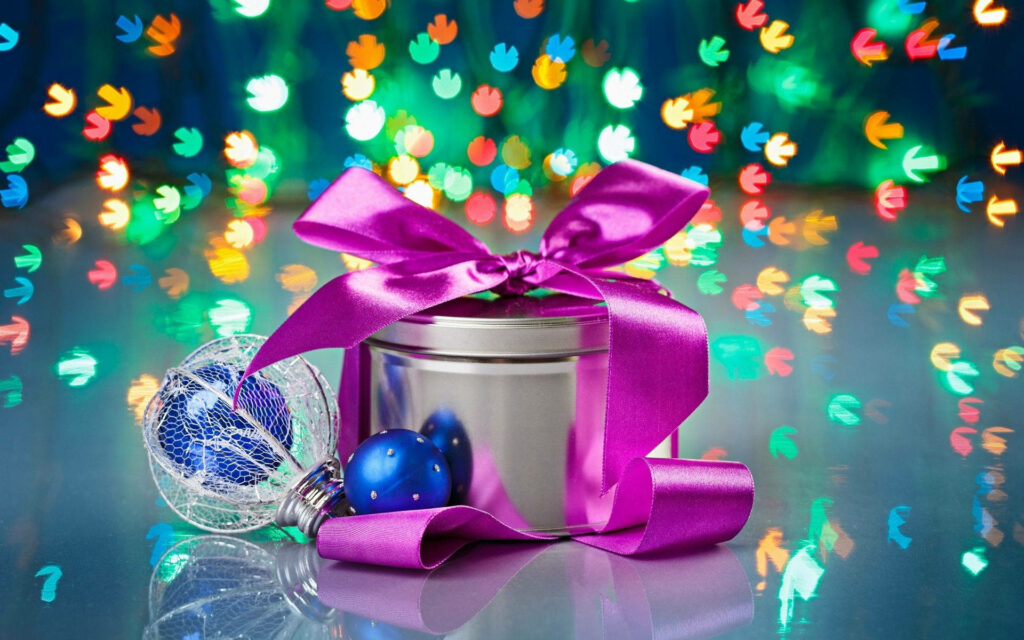 Unwrap the Holiday Cheer with a Stunning Purple Ribbon Wallpaper