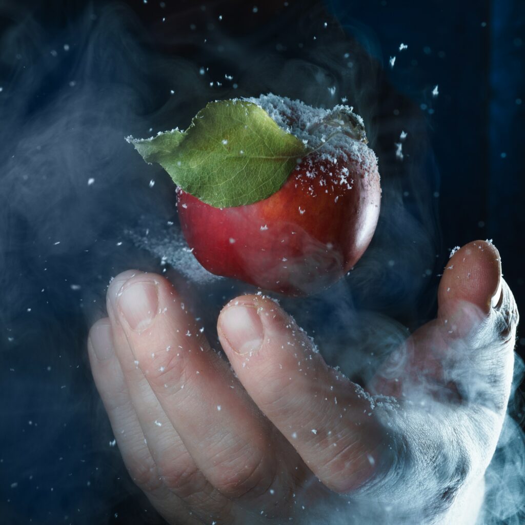 Frosted Red Apple Wallpaper: Magical Winter Scene Background