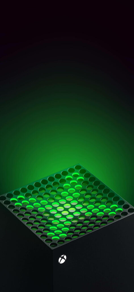 Glowing Green X: A Captivating Shot of Xbox Series X Console's Resplendent Light Display Wallpaper