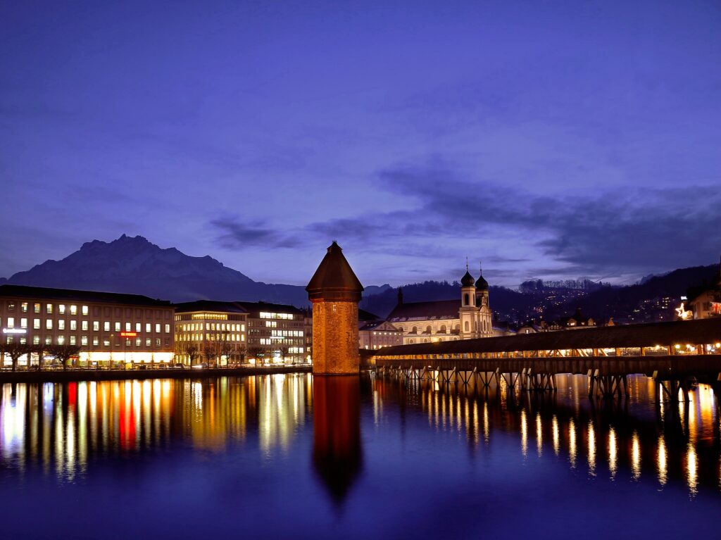 Enchanting Lucerne Night View Wallpaper: Chapel Bridge Reflection