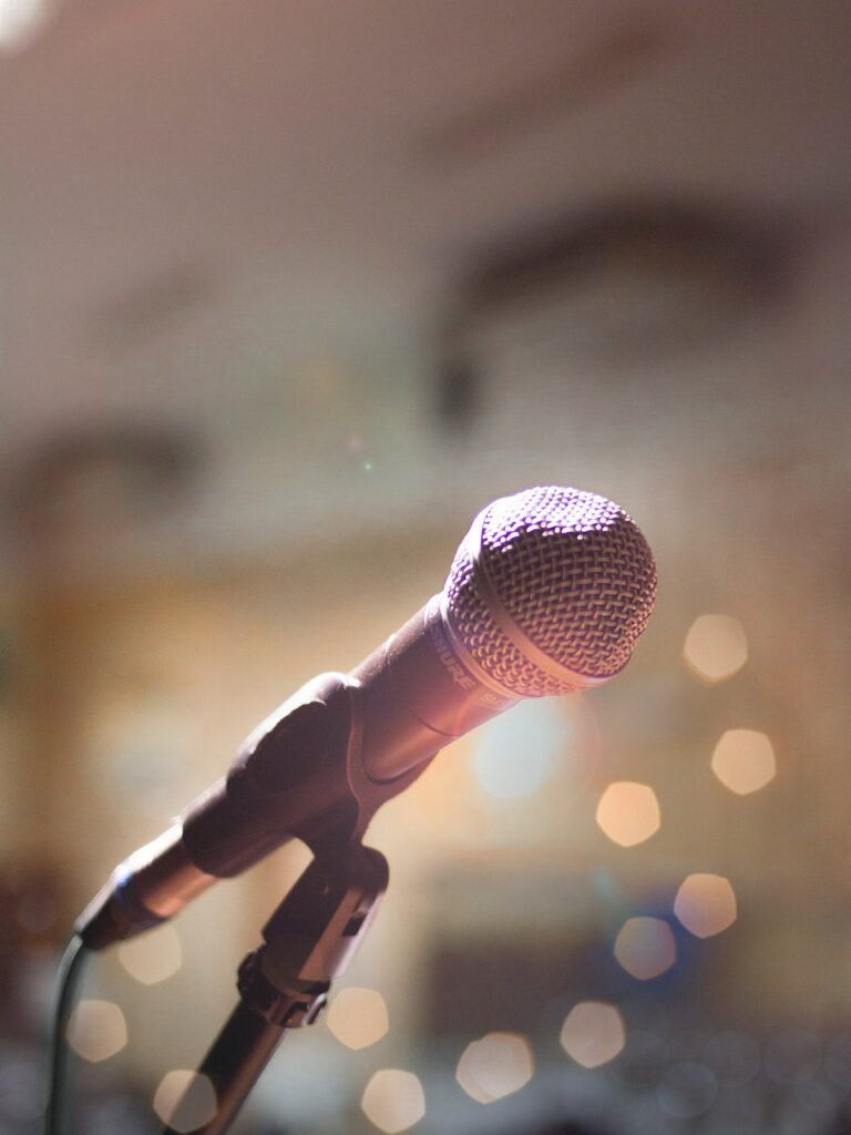 Enchanting Microphone Close-Up with Soft Lighting & Bokeh Wallpaper