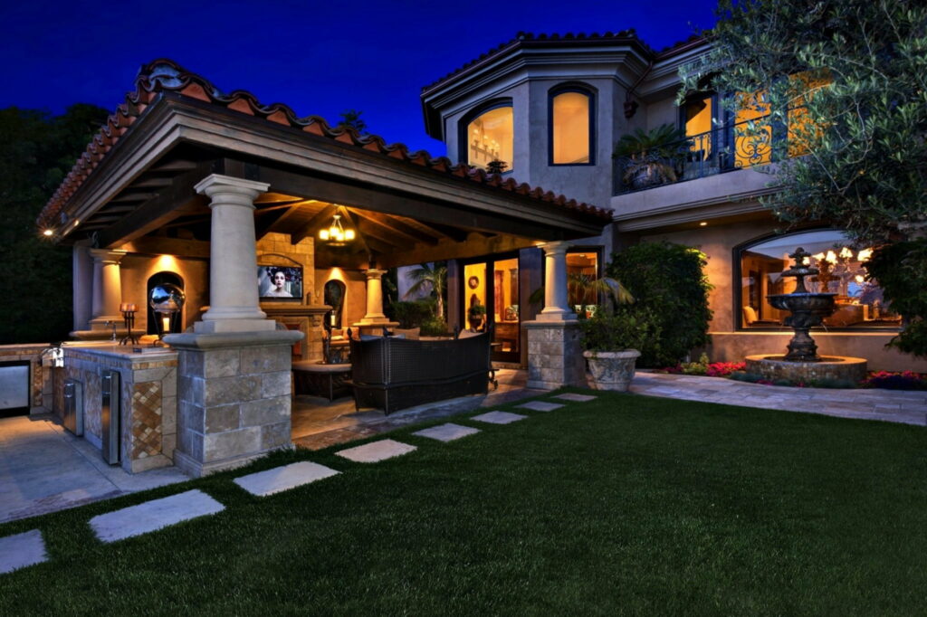 Enchanting Nightscapes: Illuminated House and Lush Garden Setting - HD Wallpaper Background