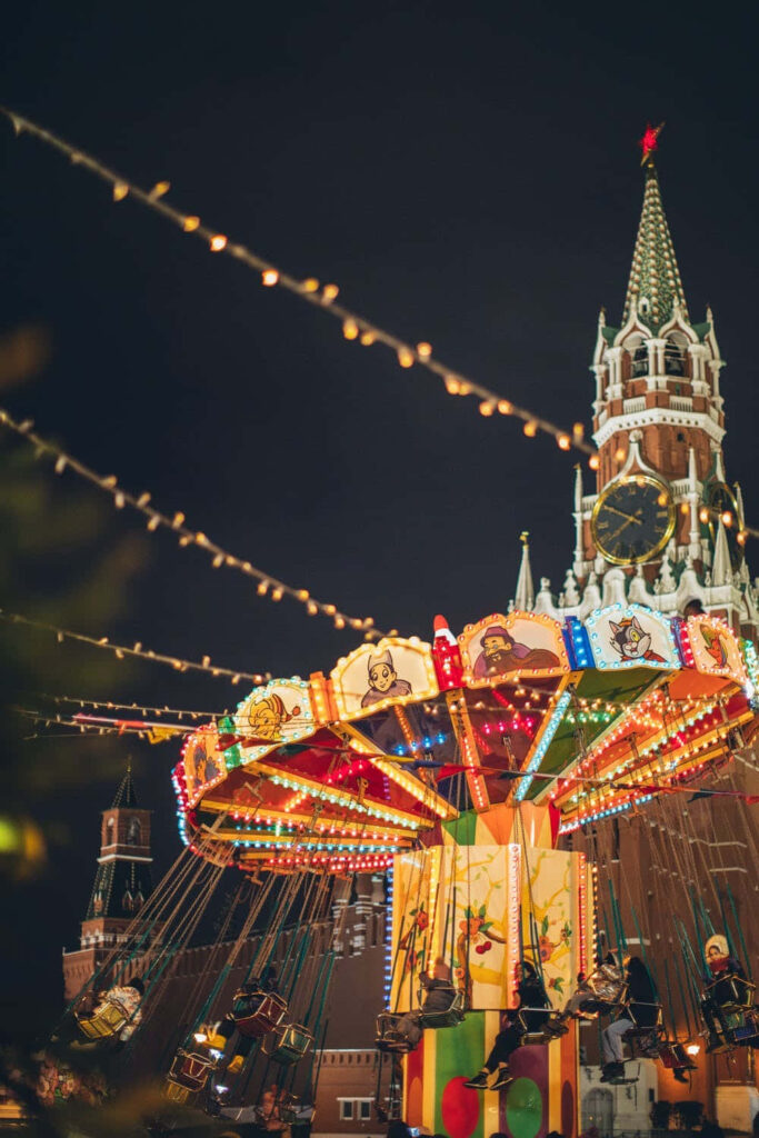 Vibrant Carousel Wallpaper: Colorful Lights & Night Sky Bliss