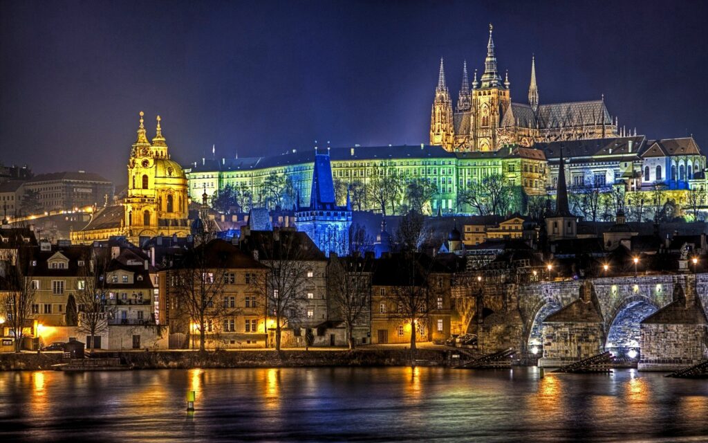 Enchanting Prague Night Wallpaper: Charles Bridge & Castle Reflection
