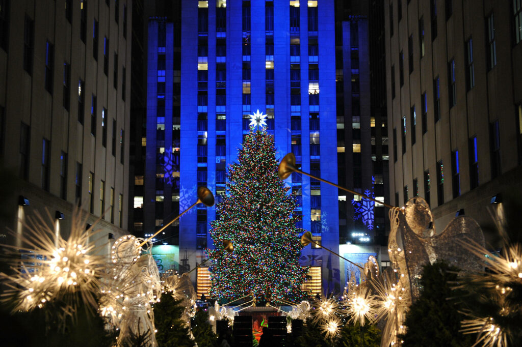 Enchanting Christmas Tree Scene at Rockefeller Center: Holiday Magic Wallpaper