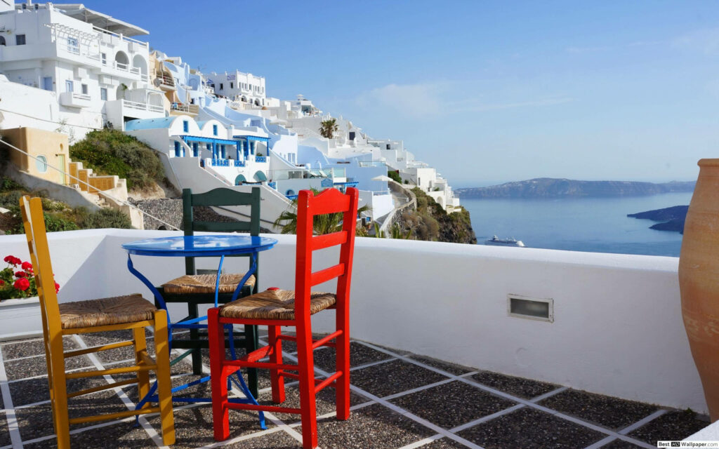 Enchanting Santorini: Transport Yourself to Dreamy Porch Views for Your Zoom Background Wallpaper