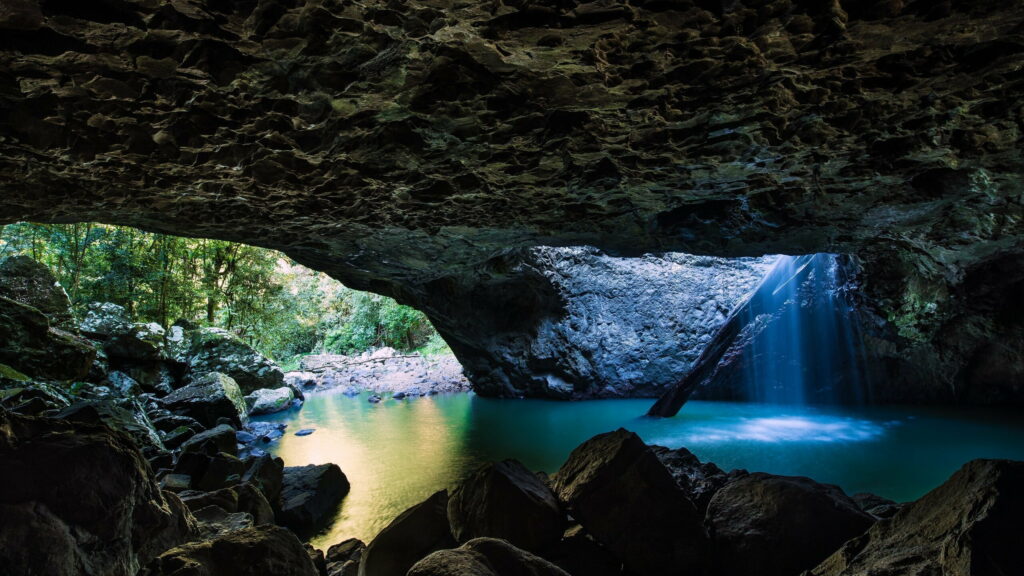 Majestic Cascades: Verdant Paradise of Nature's Hidden Grotto Wallpaper