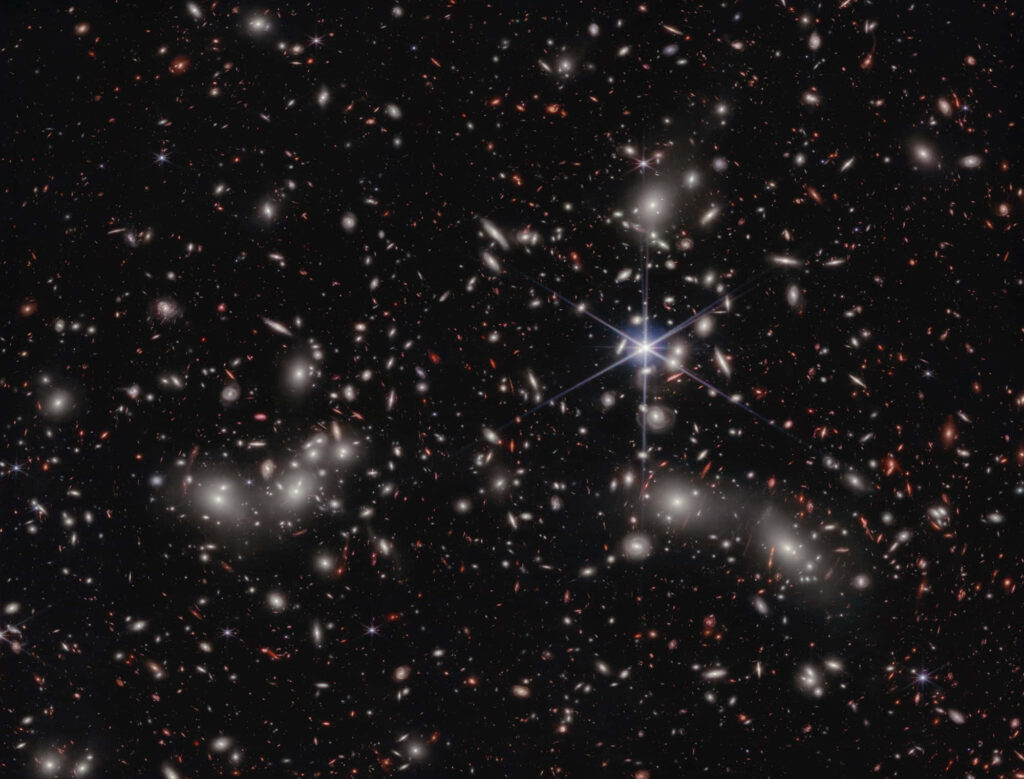 Stunning cosmic wallpaper featuring galaxies and stars glowing in the vastness of space.