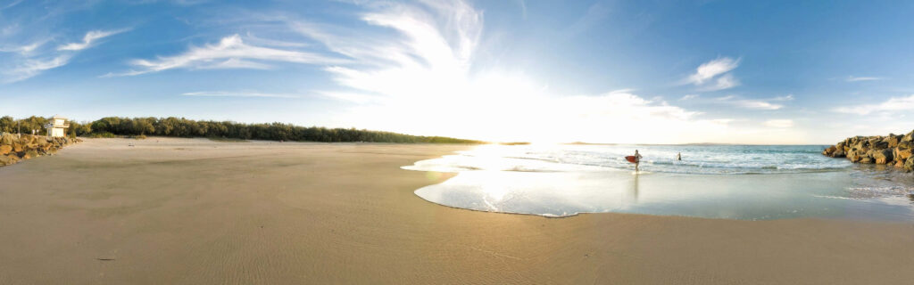 Endless Summer Beach Dual Monitor Wallpaper for Relaxed Workspaces