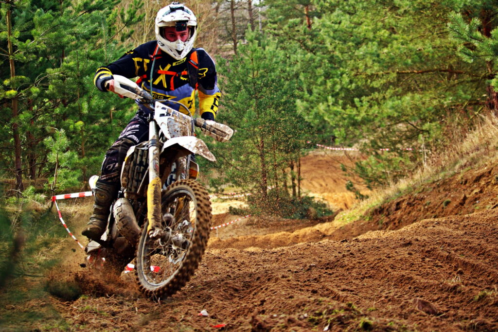 Thrilling Enduro Cross: A High-Octane Motocross Adventure Wallpaper