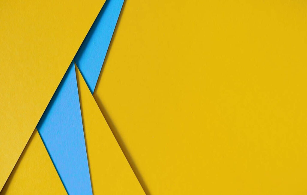 Vibrant Geometric Delight: Revitalize Your Desktop Screen with Electrifying Colors Wallpaper