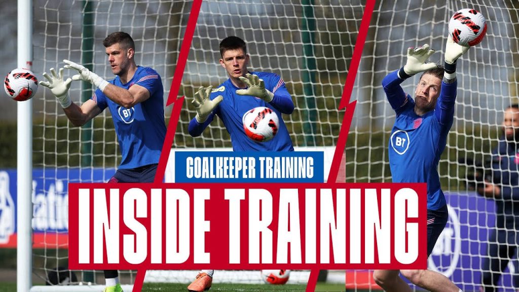 England goalkeepers Fraser Forster Jordan Pickford Nick Pope training in blue kits by goal net wallpaper