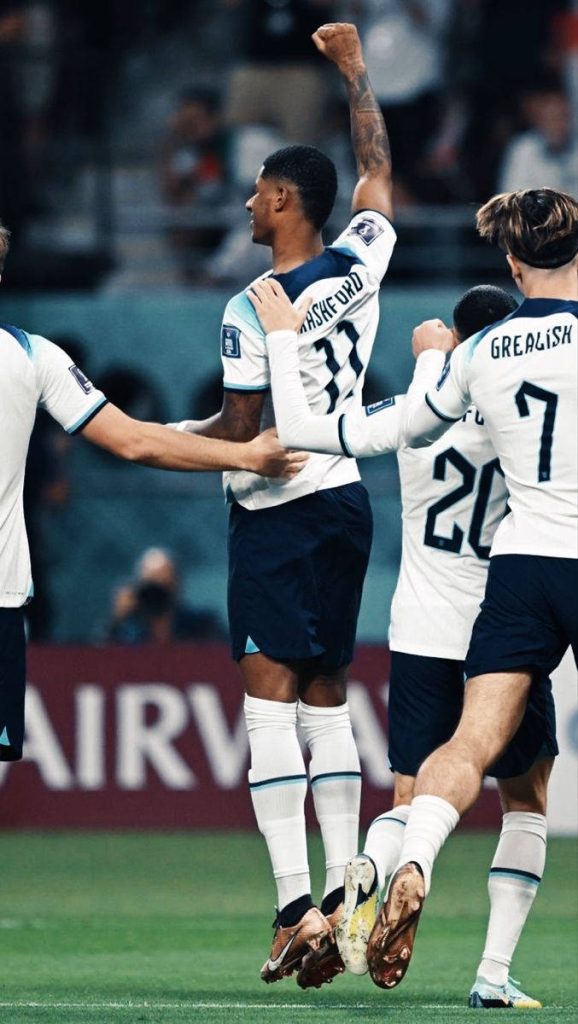 England FIFA World Cup wallpaper with Rashford Grealish and Foden in white kits action shot