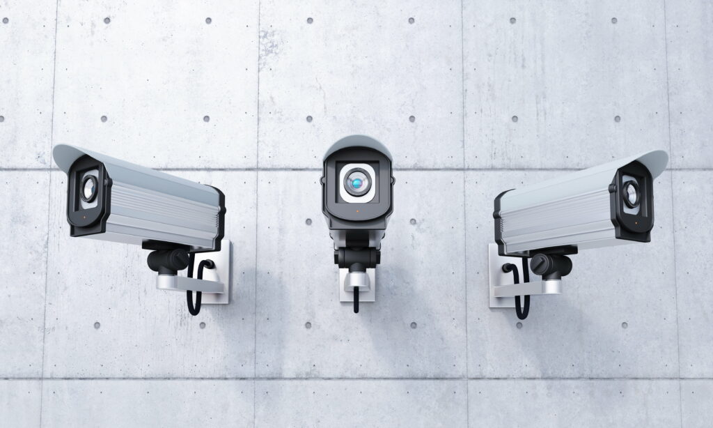 Technological Vigilance: A Captivating 4K Wallpaper featuring CCTV Security Cameras