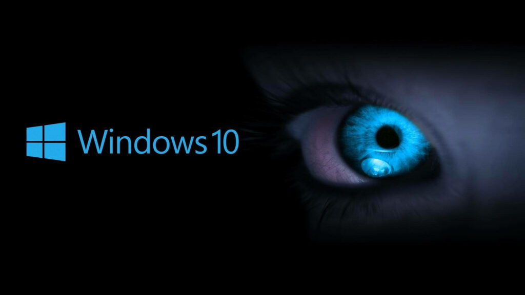 Enigmatic Gaze: Mesmerizing Windows 10 Wallpaper with Piercing Blue Eyes Amidst Shadowy Background