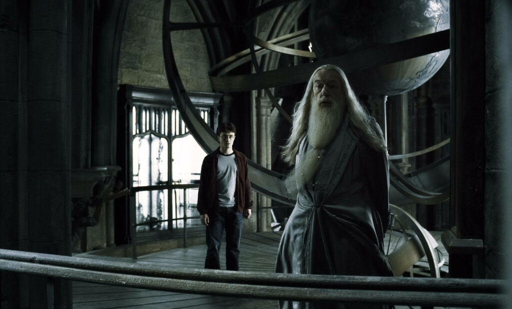 The Wise Mentor and The Chosen One Gaze into the Enigmatic Space - Albus Dumbledore Background Snapshot Wallpaper
