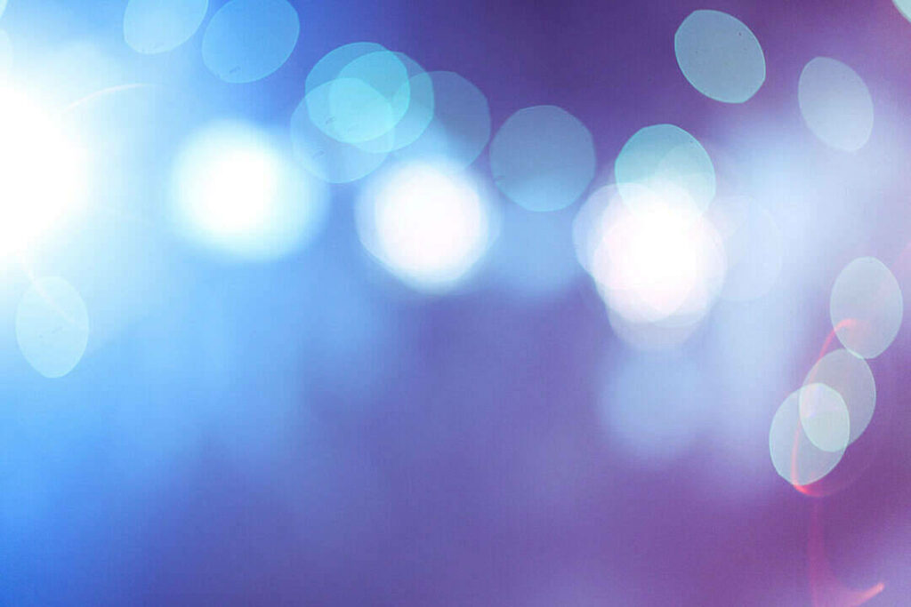 Mystical Night Visions: Ethereal Bokeh Lights on Dark Canvas Wallpaper