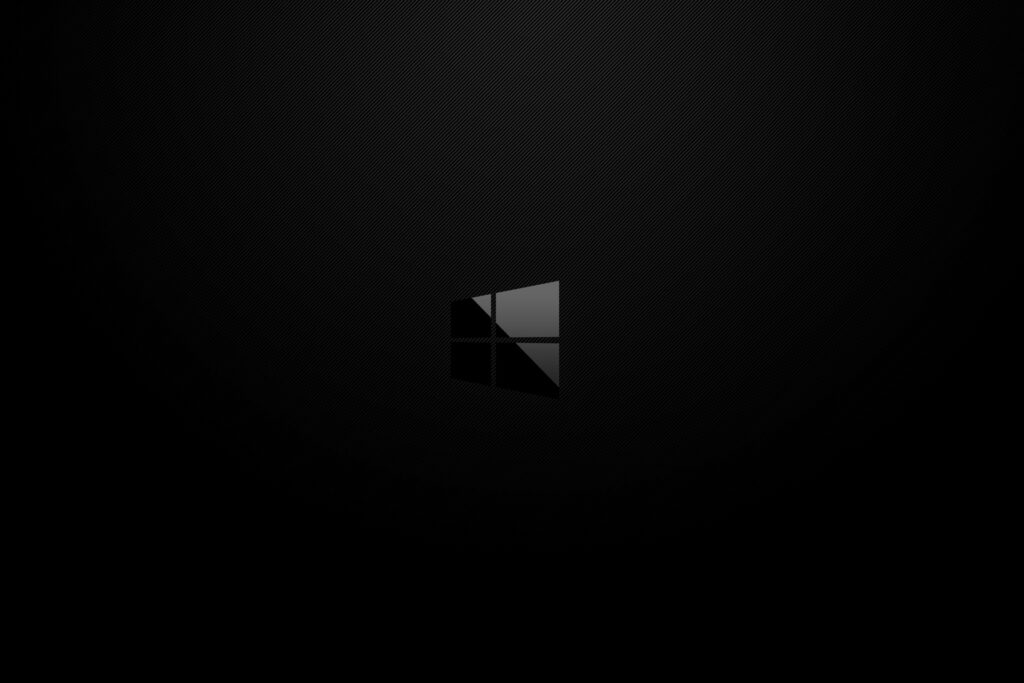 The Enigmatic Presence of the Illuminated Windows Logo in a Cryptic Minimalist Masterpiece Wallpaper