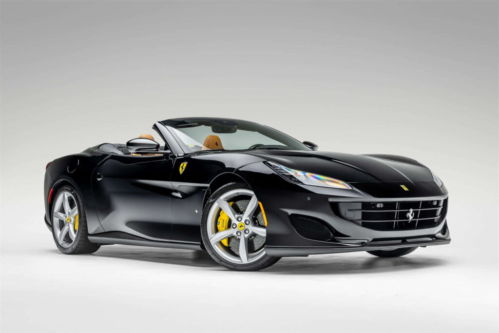 Black Ferrari Portofino against a Grey Background Wallpaper