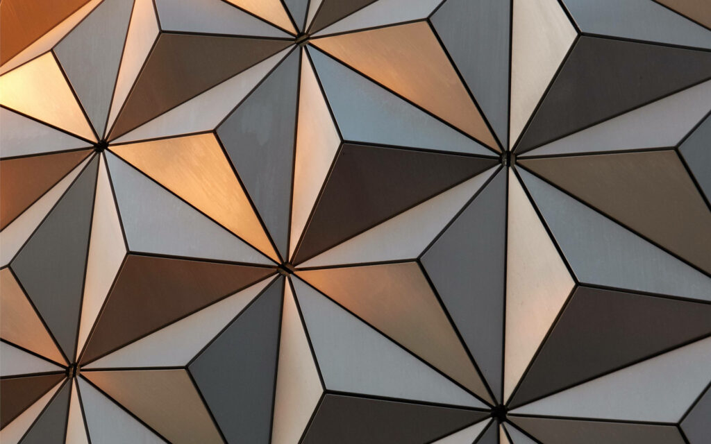 Intricate Epcot Globe Pattern: Metallic Triangles & Subtle Lighting Wallpaper