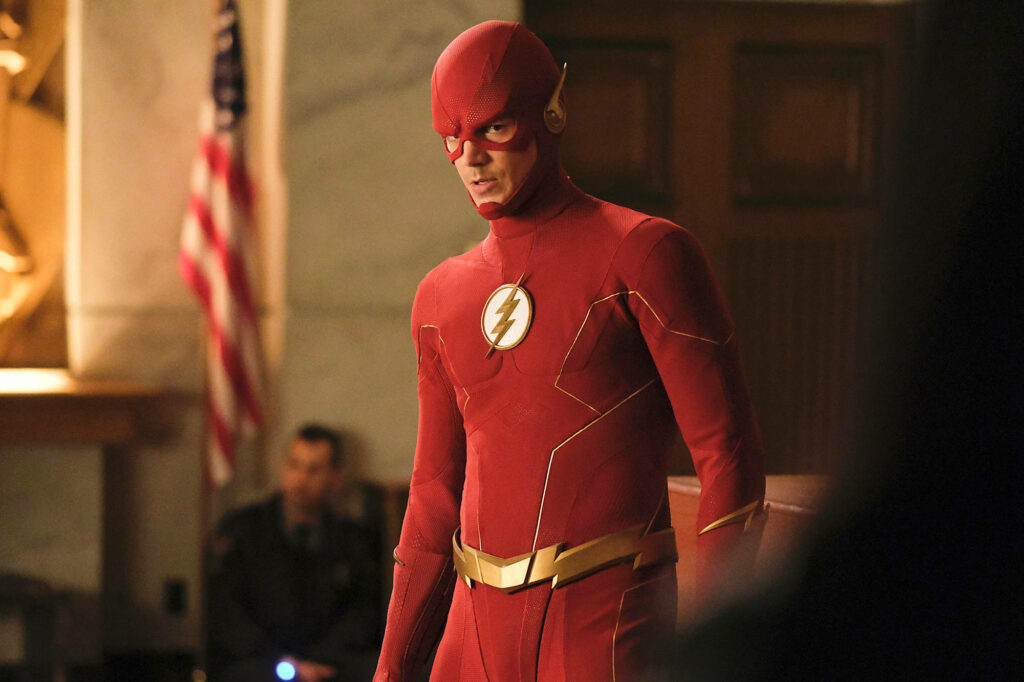 Barry Allen: Determined Flash in Iconic Red Suit - Wallpaper Background