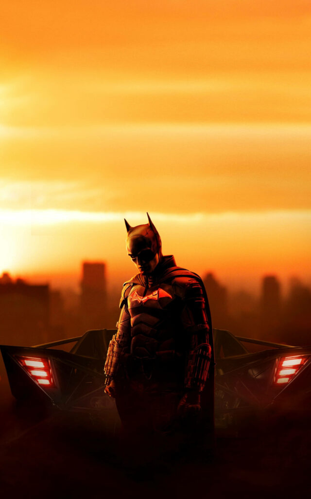 Batman Wallpaper: Iconic Hero & Batmobile at Sunset Skyline