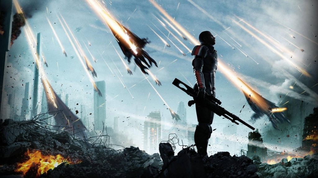 Commander Shepard stands in war-torn battlefield as Reapers attack in epic Mass Effect 3 wallpaper