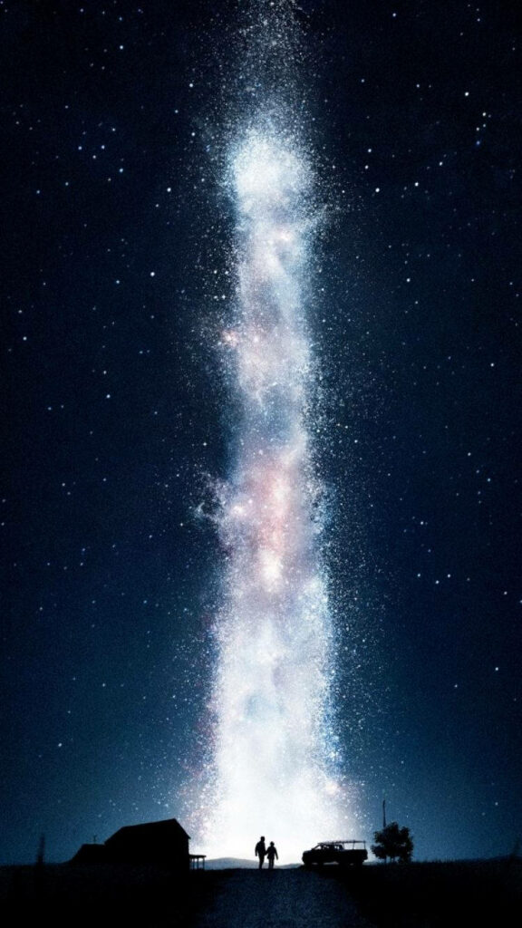 Cosmic star explosion with two figures under shimmering interstellar night sky wallpaper background