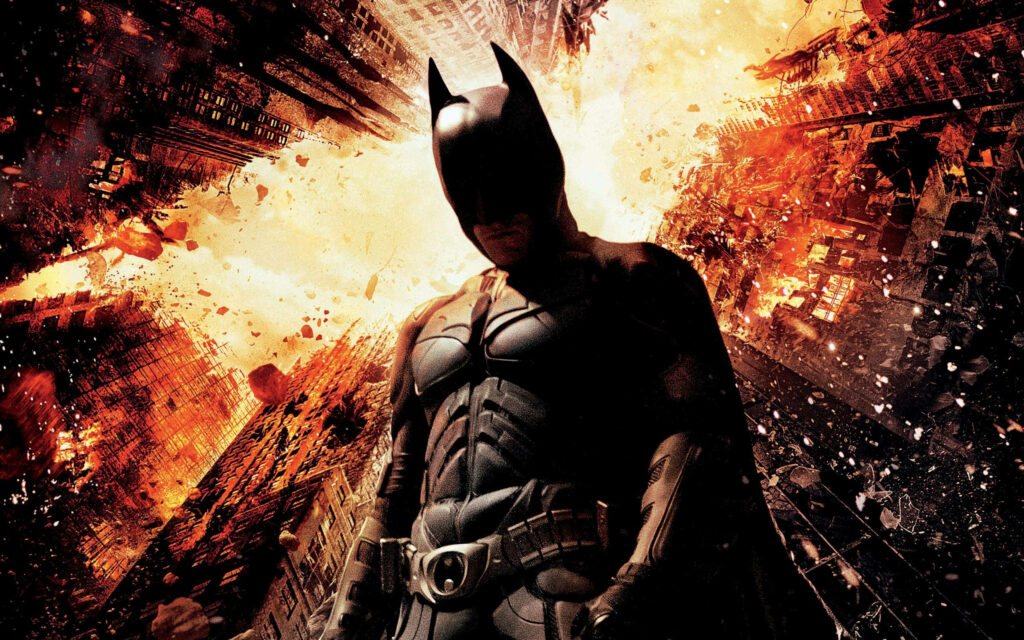 Heroic Dark Knight Wallpaper: Gotham's Icon Amidst Fiery Explosion